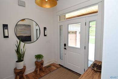 Experience lake living at The Reserve in this beautifully - photo 6