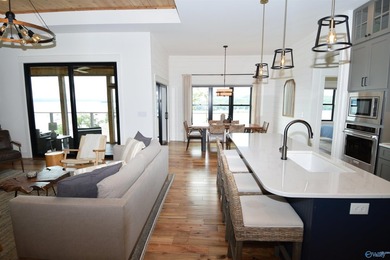 Experience lake living at The Reserve in this beautifully - photo 8