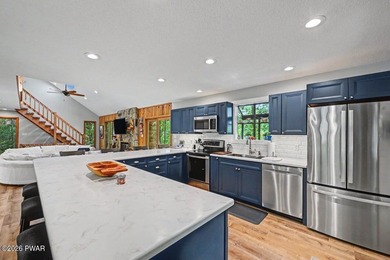 Turnkey and fully furnished, this beautifully updated 4-bedroom - photo 11
