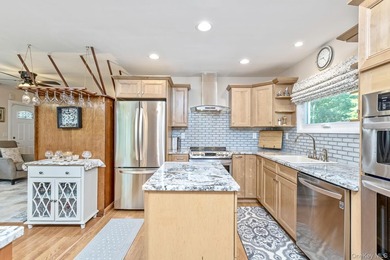 Welcome to 276 Parkway Drive in the Peconic River Park community - photo 14