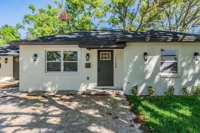 FULLY REMODELED & ZONED FOR TOP A-RATED SCHOOLS! Welcome to 1104 - photo 1