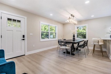 FULLY REMODELED & ZONED FOR TOP A-RATED SCHOOLS! Welcome to 1104 - photo 5