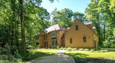 Tucked back on 5.09 wooded acres, this home offers the kind of - photo 1