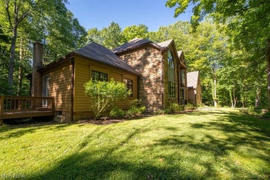 Tucked back on 5.09 wooded acres, this home offers the kind of - photo 2