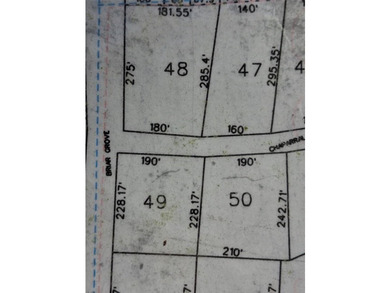 Large 1.06 acre heavily wooded lot located in the gated - photo 3