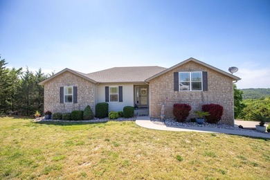 Panoramic views overlooking the Ozark Hills surround this - photo 2