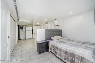 Quiet block, brick home, brand new roof, and a private driveway - photo 15