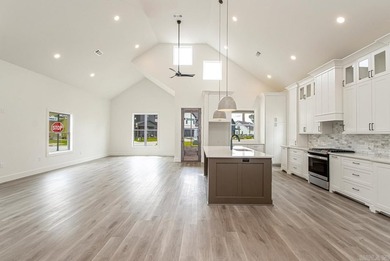Welcome to 312 Gardens Lane, your dream home nestled in the - photo 4