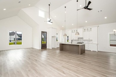 Welcome to 312 Gardens Lane, your dream home nestled in the - photo 5