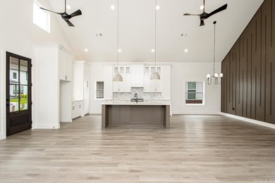Welcome to 312 Gardens Lane, your dream home nestled in the - photo 6