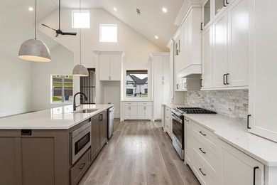 Welcome to 312 Gardens Lane, your dream home nestled in the - photo 10