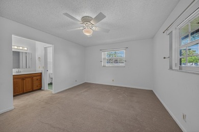 A fantastic location in a well-manicured community. This large 2 - photo 5