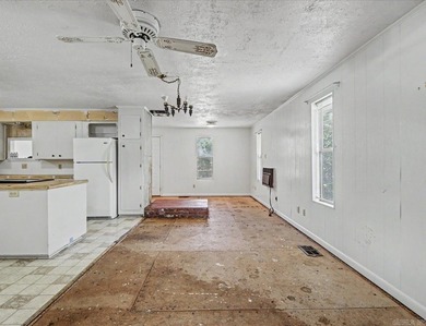 Unlock the potential of this 1,843 sq. ft. home located at 211 - photo 2