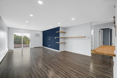 Rarely available and fully reimagined, this stunning corner unit - photo 5