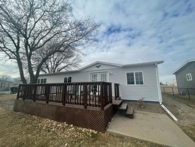 TOTALLY UPDATED HOME ON DEEDED LAND WITH GREAT VIEWS! - Lake Home Sale Pending in Johnson Lake, Nebraska
