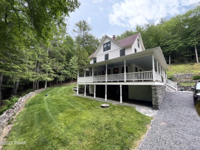 A gated drive along the Shohola Brook welcomes you to this - Lake Home For Sale in Shohola, Pennsylvania