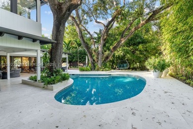 Experience a modern South Coconut Grove residence that perfectly - photo 2