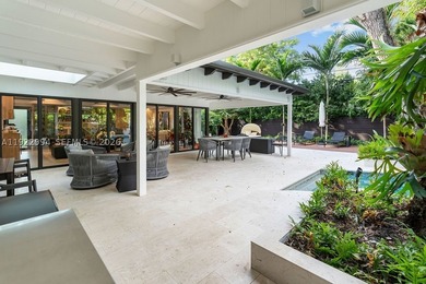Experience a modern South Coconut Grove residence that perfectly - photo 9