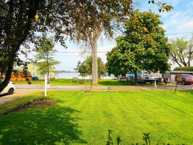 Rare find in Manitou Beach: dedicated pontoon boat garage behind - photo 5