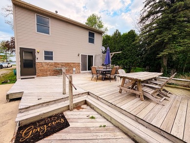 Rare find in Manitou Beach: dedicated pontoon boat garage behind - photo 9