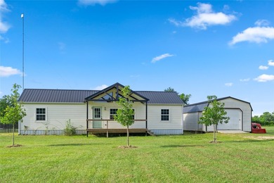 Enjoy the freedom of country living on just over 5 unrestricted - photo 1