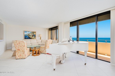 Perched high above the shoreline, this exceptional 12th-floor