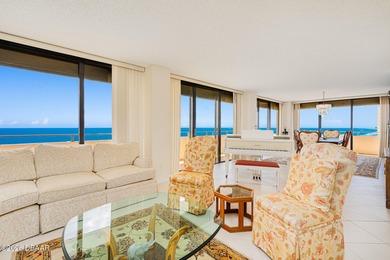 Perched high above the shoreline, this exceptional 12th-floor