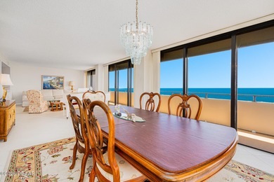 Perched high above the shoreline, this exceptional 12th-floor