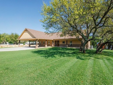 Built in 2021, this well-constructed lake house showcases - photo 1