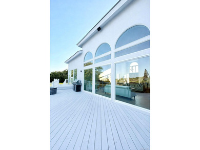 This contemporary home offers approximately 4890 square feet of - photo 9