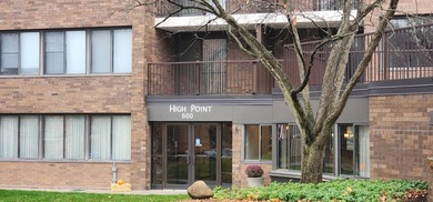 Welcome to Unit #104 at High Point - a beautifully designed - photo 1