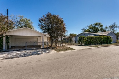 Discover this inviting 3-bedroom, 2-bathroom home situated on a - photo 2