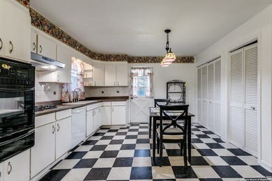 Discover this inviting 3-bedroom, 2-bathroom home situated on a - photo 3
