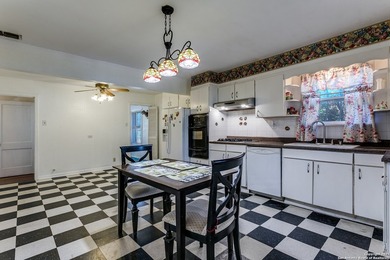 Discover this inviting 3-bedroom, 2-bathroom home situated on a - photo 4