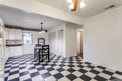 Discover this inviting 3-bedroom, 2-bathroom home situated on a - photo 5