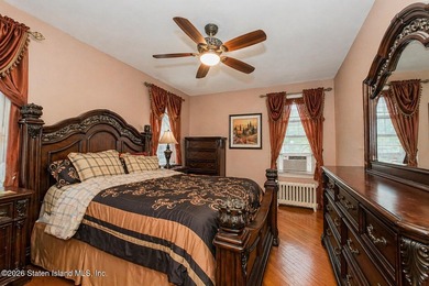 Located at 1879 Haring Street, this full brick end-unit - photo 14