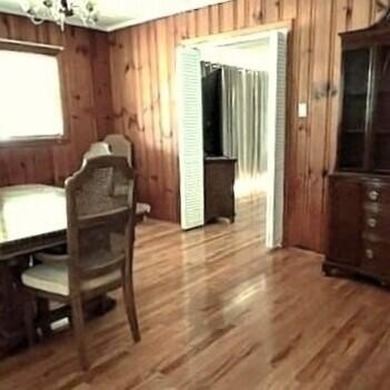 This well maintained 4 BR, 2 BA home is located just inside the - photo 2