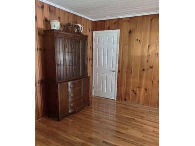 This well maintained 4 BR, 2 BA home is located just inside the - photo 3