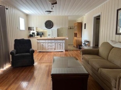 This well maintained 4 BR, 2 BA home is located just inside the - photo 4