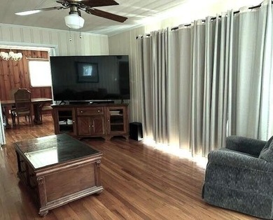 This well maintained 4 BR, 2 BA home is located just inside the - photo 5