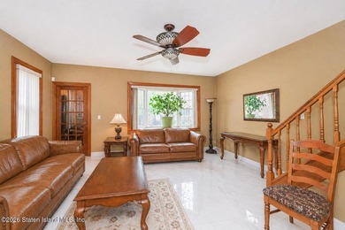 Located at 1879 Haring Street, this full brick end-unit - photo 25