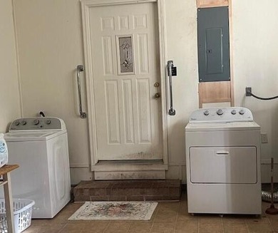 This well maintained 4 BR, 2 BA home is located just inside the - photo 9