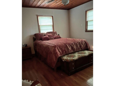 This well maintained 4 BR, 2 BA home is located just inside the - photo 10