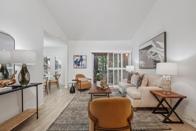 Welcome home to this beautifully updated third-floor end unit