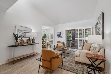 Welcome home to this beautifully updated third-floor end unit