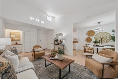 Welcome home to this beautifully updated third-floor end unit