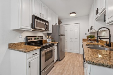 Welcome home to this beautifully updated third-floor end unit