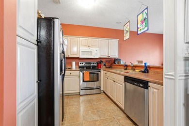 Updated 3BR/2BA condo in desirable Sweetwater community in - photo 12