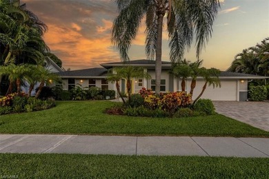 Discover this exceptional lakefront pool home in the highly - photo 2