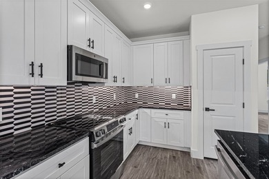 Discover this stunning brand-new 4-bedroom, 2-bathroom home in - photo 4